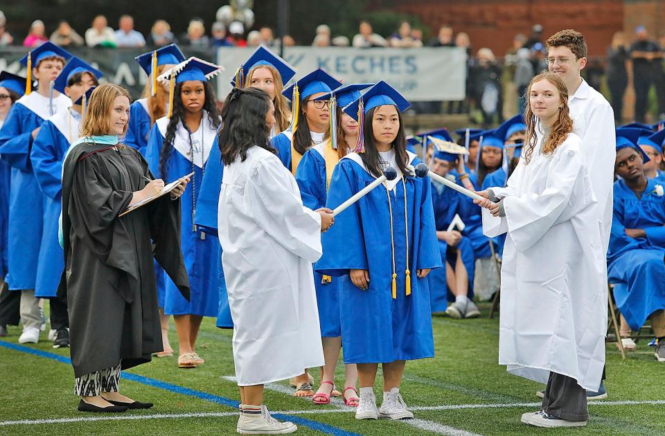 Tiffany Le waits for her name to be called during Quincy High School's commencement ceremonies at Veterans Stadium on Monday, June 5, 2023.