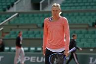 Russian tennis player Maria Sharapova takes part in a training session prior the 2015 French Open tennis championships at the Roland Garros stadium in Paris on May 20, 2015