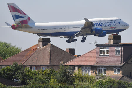 FILE PHOTO: A British Airways Boeing 747 comes in to land at Heathrow airport in London, June 25, 2018. REUTERS/Toby Melville/File Photo