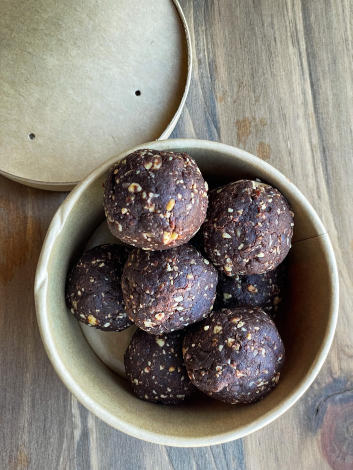 Melted Honey features nourish balls, including these chocolate peanut butter balls.
