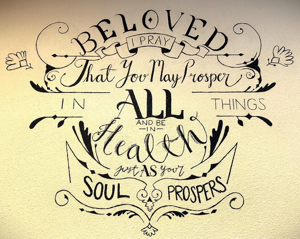 Wall art at Le Testimony Organic Bistro restaurant in Redding carries the Biblical message: “Beloved, I pray that you may prosper in all things and be in health just as your soul prospers.”