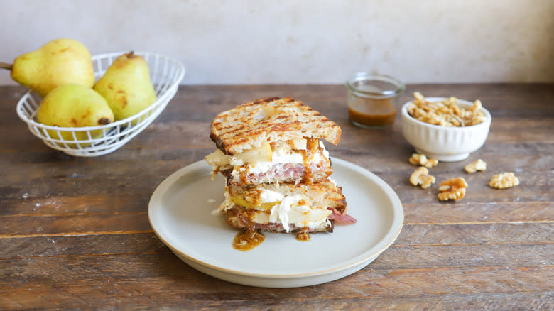 Toasted panini on cutting board