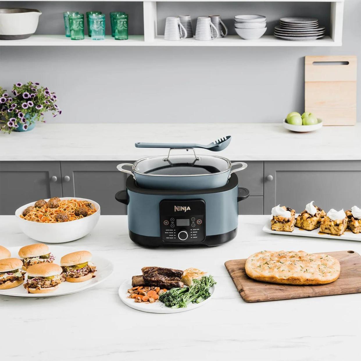  A Ninja slow cooker sitting on kitchen counter 