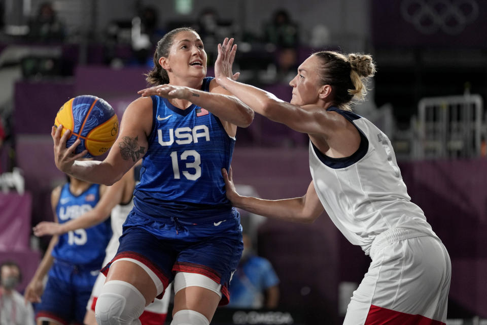 United States' Stefanie Dolson (13) heads to the basket past Anastasiia Logunova, of the Russian Olympic Committee, during a women's 3-on-3 basketball game at the 2020 Summer Olympics, Sunday, July 25, 2021, in Tokyo, Japan. (AP Photo/Jeff Roberson)