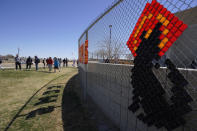 Students play outdoors before leaving for the spring break at California City Middle School in California City, Calif., on Friday, March 11, 2022. Since the pandemic started, experts have warned of a mental health crisis facing American children that is now visibly playing out at schools across the country. (AP Photo/Damian Dovarganes)