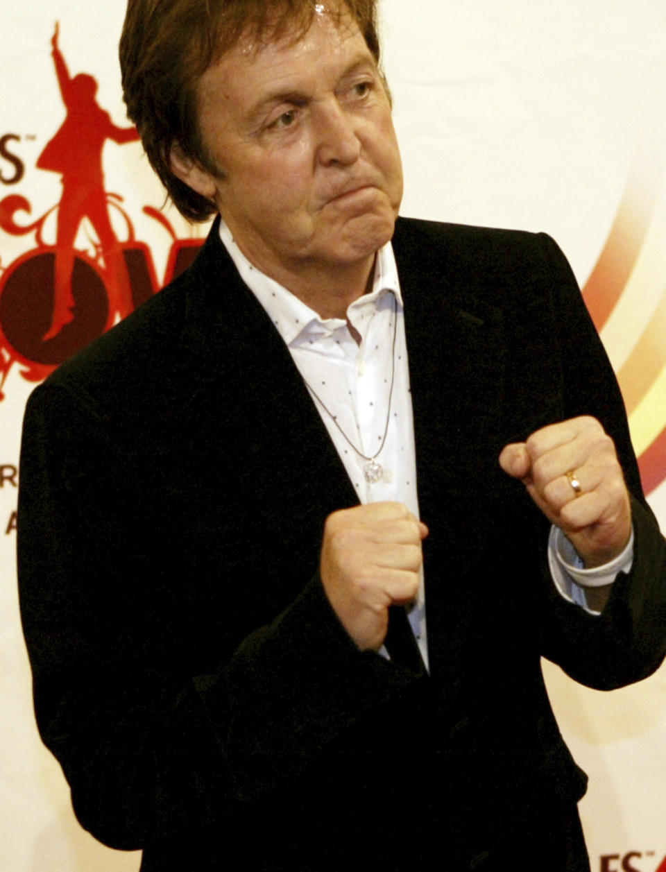 Paul McCartney walks the red carpet at the premiere of "Love," a surrealistic portrayal of the Fab Four's career performed by Cirque du Soleil in Las Vegas, June 30, 2006. On Tuesday, April 9, 2024, it was announced that the final curtain will come down July 7 on Cirque du Soleil's long-running show “The Beatles Love," a cultural icon on the Las Vegas Strip that brought band members Paul McCartney and Ringo Starr back together for public appearances throughout its 18-year run. (Isaac Brekken/Las Vegas Review-Journal via AP)