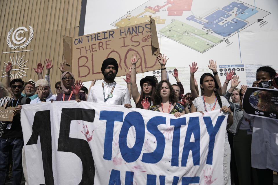 Demonstrators participate in a protest advocating for the 1.5 degree warming goal at the COP27 U.N. Climate Summit, Wednesday, Nov. 16, 2022, in Sharm el-Sheikh, Egypt. (AP Photo/Nariman El-Mofty)