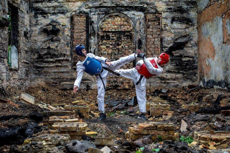 A Ukrainian staged photo shows Taekwondo training in a sports facility destroyed by Russia. The photo is part of a series set to show sports facilities damaged or destroyed since the start of Russia's full-scale war. (President’s Office)