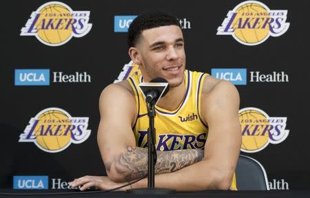 FILE PHOTO: Sep 24, 2018; El Segundo, CA, USA; Los Angeles Lakers guard Lonzo Ball answers a question during the Los Angeles Lakers media day at the UCLA Health Training Center. Mandatory Credit: Robert Hanashiro-USA TODAY Sports/File Photo