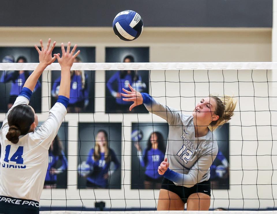 Rylee Hissey bangs a kill for McCallum in a four-set victory over Ann Richards Tuesday at Ann Richards School. McCallum took the final district win over the host Stars 3-1.