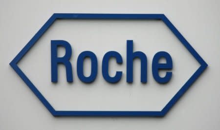 FILE PHOTO: The logo of Swiss pharmaceutical company Roche is pictured on the company's headquarters in Basel February 4, 2009.  REUTERS/Christian Hartmann  (SWITZERLAND)/File Photo