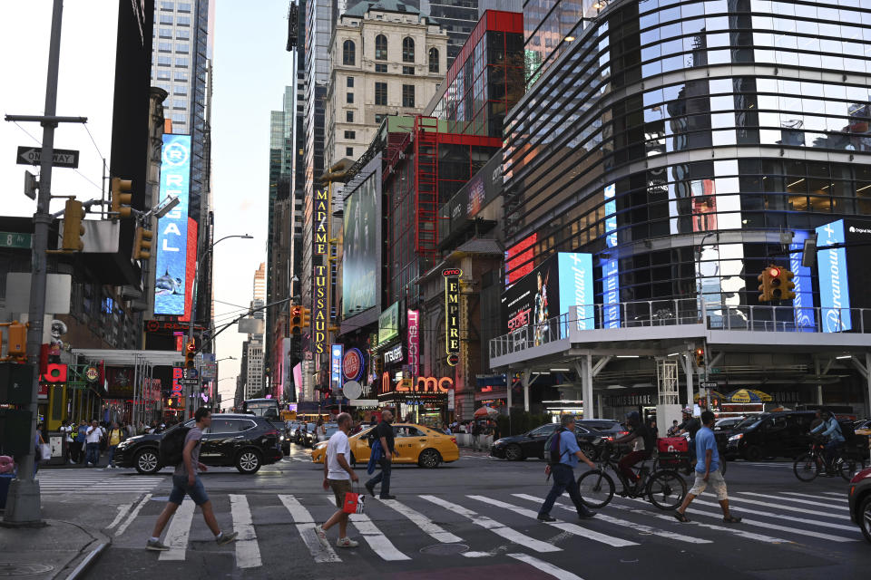 Photo by: NDZ/STAR MAX/IPx 2022 8/24/22 People walk in Times Square on August 24, 2022 in New York.