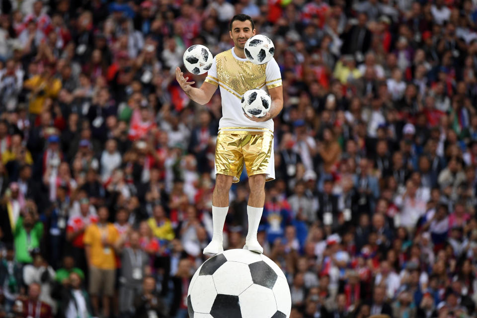 <p>A performer juggles with 3 footballs during the Opening Ceremony before the Russia 2018 World Cup Group A football match between Russia and Saudi Arabia at the Luzhniki Stadium in Moscow on June 14, 2018. (Photo by Kirill KUDRYAVTSEV / AFP) / RESTRICTED TO EDITORIAL USE – NO MOBILE PUSH ALERTS/DOWNLOADS (Photo credit should read KIRILL KUDRYAVTSEV/AFP/Getty Images) </p>