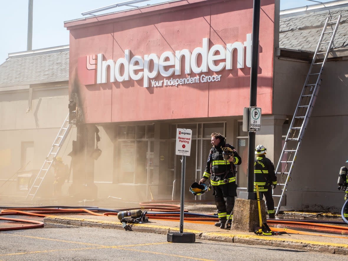 Kentville Volunteer Fire Department Chief Scott Hamilton says firefighters found heavy smoke around the front of the building. (Ian Swinamer - image credit)