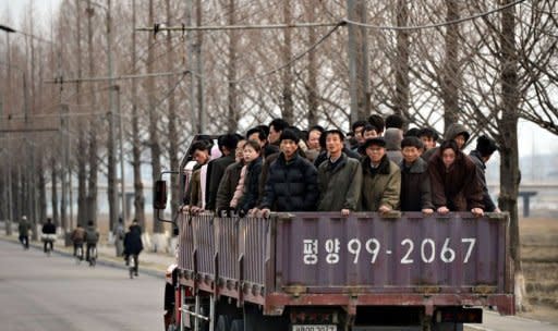 North Koreans commute to work in Pyongyang. North Korea is hardly known for offering a warm welcome to the world's press, and never before has it given access to a sensitive site featuring its latest space hardware