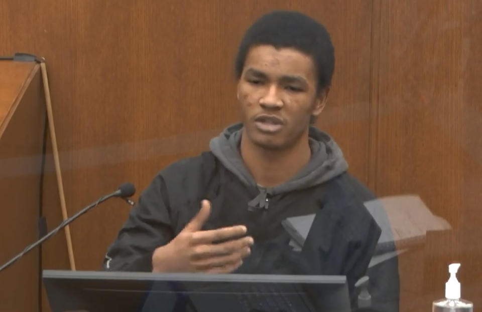 In this image from video, witness Christopher Martin answers questions as Hennepin County Judge Peter Cahill presides Wednesday, March 31, 2021, in the trial of former Minneapolis police Officer Derek Chauvin at the Hennepin County Courthouse in Minneapolis, Minn. Chauvin is charged in the May 25, 2020 death of George Floyd. (Court TV via AP, Pool)