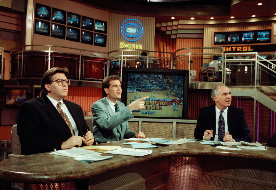 Jim Nantz (center) sits alongside Mike Francesa (left) and Billy Packer for a CBS studio show during coverage of the 1991 NCAA men's basketball tournament from their New York studios. (AP Photo/David Cantor)