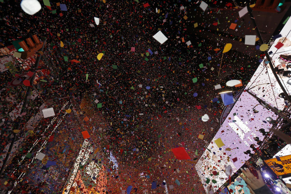 Confetti falls during a New Year's celebration in New York's Times Square, Wednesday, Jan. 1, 2020. (AP Photo/Adam Hunger)