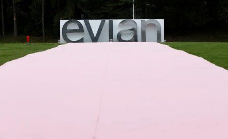 An Evian logo, part of Danone food company, is pictured outside the Evian water bottling plant in Publier near Evian-les-Bains, France, September 12, 2017. REUTERS/Denis Balibouse