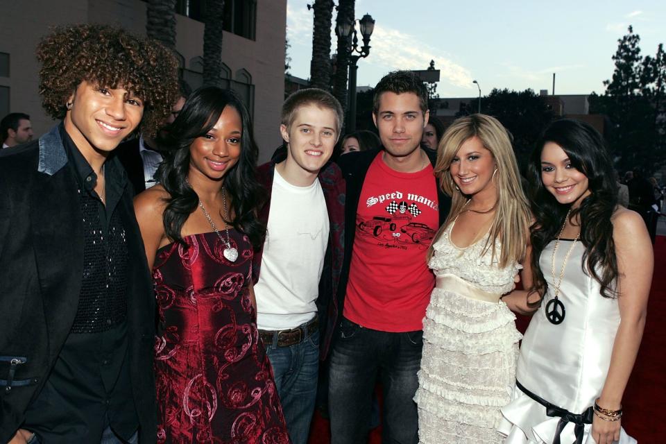 <p>Anyway, here's the gang all attending the 2006 American Music Awards, except WAIT A FUCKING SECOND, that's not Zac Efron! No, it's Canadian actor Drew Seeley, who — and make sure you're sitting down here because this is one helluva #TruthBomb — actually provided (most of) Zac's character Troy Bolton's vocals, after Disney decided Zac had the look but not quite the voice.</p>