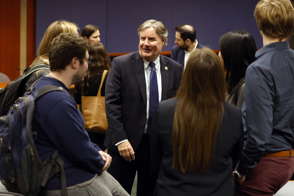 Supreme Court Associate Justice Sam Ervin IV, center, speaks with students following the North Carolina Supreme Court Candidate Forum at Duke University Law School in Durham, N.C., Wednesday, Oct. 26, 2022. (AP Photo/Karl DeBlaker)