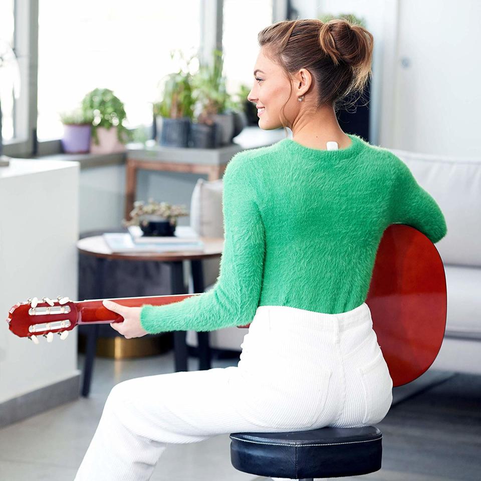 Whether you work at a desk or practice an instrument, a posture corrector can help relieve aches and pains. (Photo: Amazon)