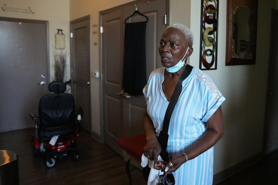 Regina Anderson, 63, who rents a unit at Indianapolis Housing Agency's Millikan on Mass apartment building, talks about her air conditioning being out on Tuesday, June 14, 2022, outside the building in Indianapolis. According to eight tenants interviewed by IndyStar, many units at Barton Tower and Millikan on Mass, two of IHA’s largest properties, did not have working air conditioning during this week's heat wave. 