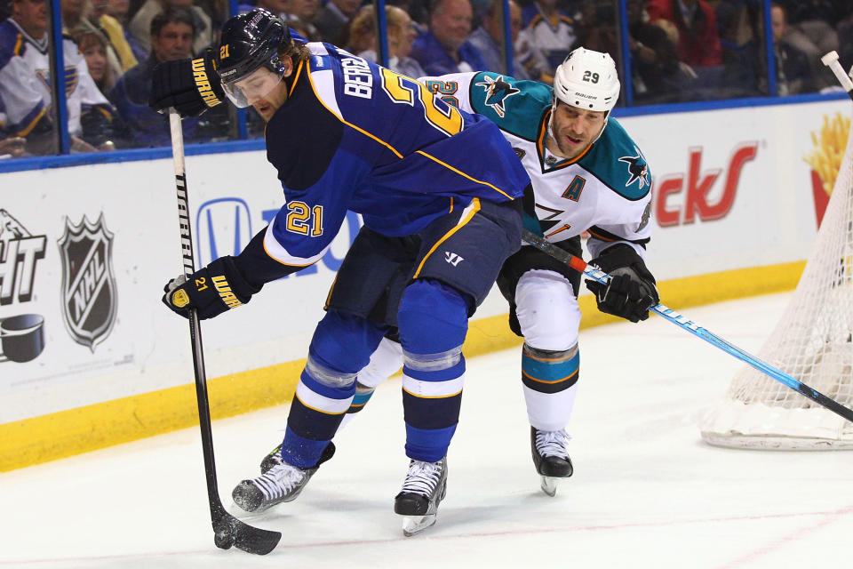 ST. LOUIS, MO - APRIL 21: Patrik Berglund #21 of the St. Louis Blues controls the puck against Ryane Clowe #29 of the San Jose Sharks during Game Five of the Western Conference Quarterfinals during the 2012 NHL Stanley Cup Playoffs at the Scottrade Center on April 21, 2012 in St. Louis, Missouri. The Blues beat the Sharks 3-1 to advance to the Western Conference Semifinals. (Photo by Dilip Vishwanat/Getty Images)