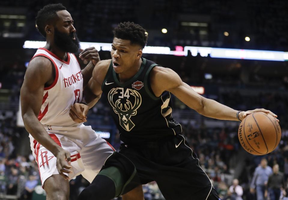 Milwaukee Bucks' Giannis Antetokounmpo tries to drive past Houston Rockets' James Harden during the second half of an NBA basketball game Wednesday, March 7, 2018, in Milwaukee. (AP Photo/Morry Gash)