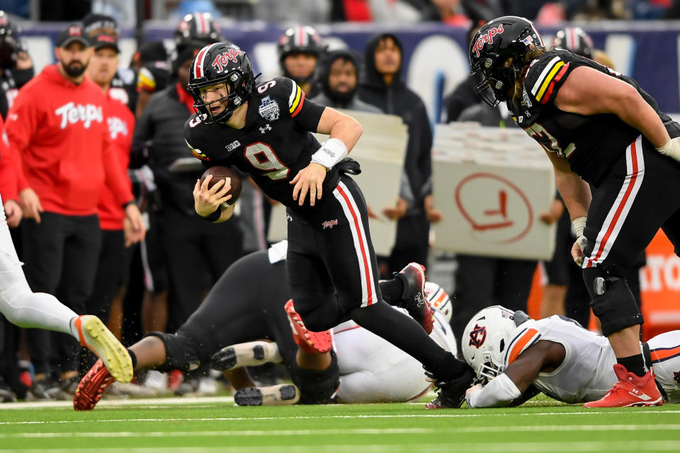 Dec. 30, 2023; Nashville, Tennessee; Maryland Terrapins quarterback Billy Edwards Jr. (9) runs the ball against the Auburn Tigers during the second half at Nissan Stadium. Steve Roberts-USA TODAY Sports