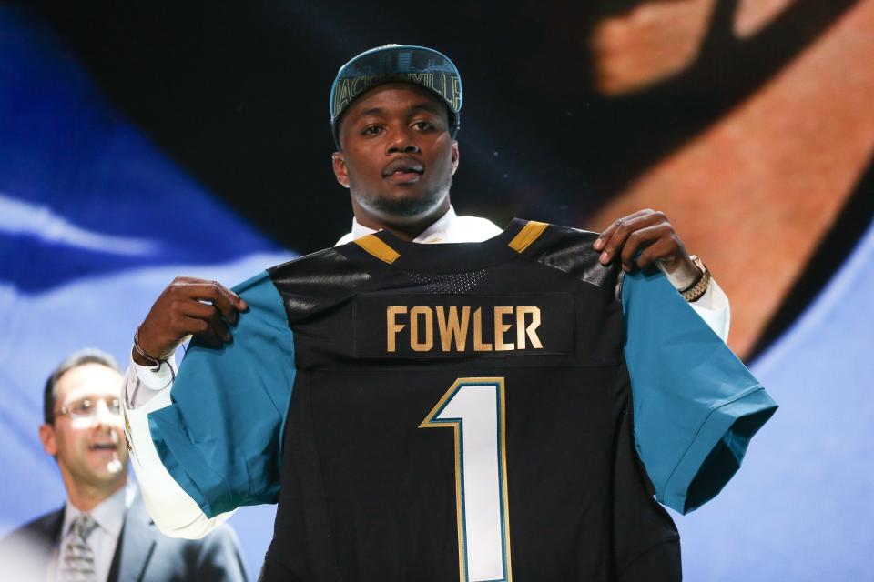 CHICAGO, IL - APRIL 30: Dante Fowler Jr. of the Florida Gators holds up a jersey after being chosen #3 overall by the Jacksonville Jaguars during the first round of the 2015 NFL Draft at the Auditorium Theatre of Roosevelt University on April 30, 2015 in Chicago, Illinois. (Photo by Jonathan Daniel/Getty Images)