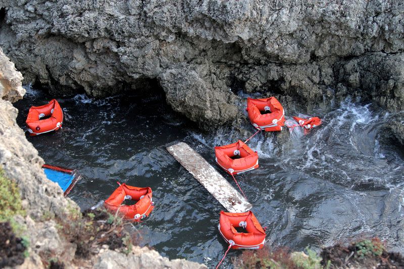 FILE PHOTO: Flotation devices are seen in the area where a migrant boat capsized off the Italian coast, on the island of Lampedusa