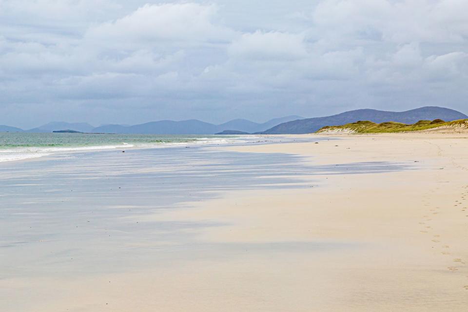<p>West Beach runs the entire length of Berneray, an isle in the North Uist, Outer Hebrides. It's comprised of three miles of white sand, and is completely unspoiled - perfect for walking along or having a picnic nearby. </p><p><a class="link " href="https://www.booking.com/" rel="nofollow noopener" target="_blank" data-ylk="slk:FIND ACCOMMODATION;elm:context_link;itc:0;sec:content-canvas">FIND ACCOMMODATION </a></p>
