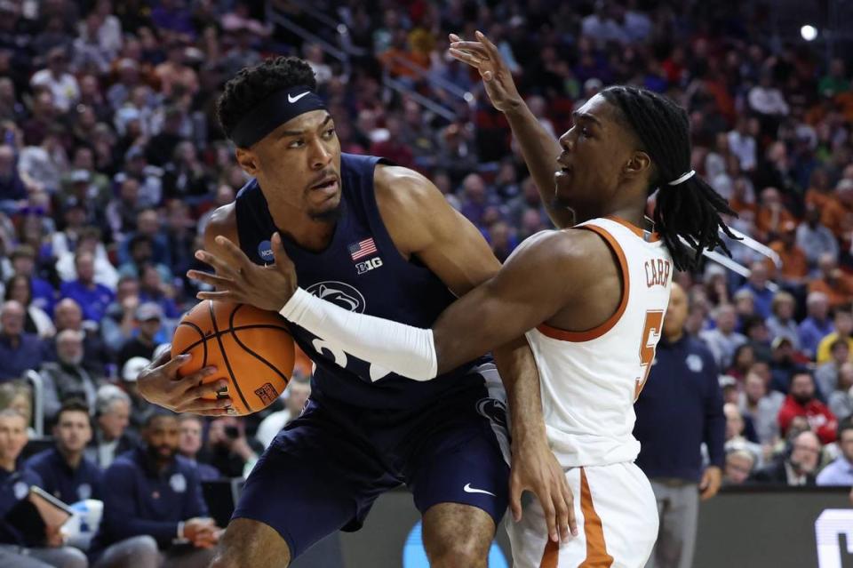 Penn State Nittany Lions guard Jalen Pickett (22) controls the ball against Texas Longhorns guard Marcus Carr (5) during the second half of Saturday’s game at Wells Fargo Arena.