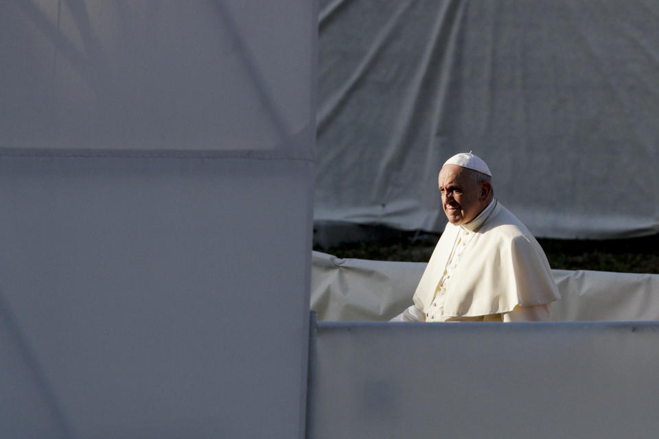 Pope Francis arrives at Rome's Circus Maximus to lead an evening prayer vigil with youths, Saturday, Aug. 11, 2018. Thousand of youths gathered for the meeting with the pontiff in preparation for the next World Youth Day that will be held in Panama next year. (AP Photo/Andrew Medichini)