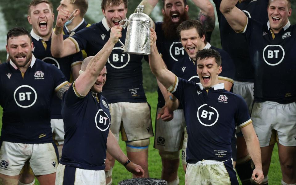 Scotland debutants David Cherry and Cameron Redpath lift the Calcutta Cup, marking the first time Scotland has won the trophy at Twickenham since 1983 during the Guinness Six Nations match between England and Scotland at Twickenham Stadium on February 6, 2021 in London, England