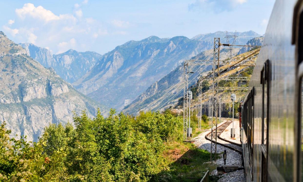 <span>The train passes over the Mala Rijeka viaduct near Podgorica, Montenegro.</span><span>Photograph: jbdodane/Alamy</span>