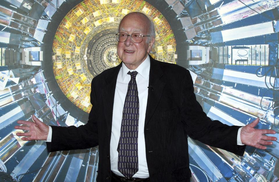 Professor Peter Higgs at the Science Museum, London on Dec. 11, 2013. The University of Edinburgh says Nobel prize-winning physicist Peter Higgs, who proposed the existence of the Higgs boson particle, has died at 94. Higgs predicted the existence of a new particle — the so-called Higgs boson — in 1964. But it would be almost 50 years before the particle’s existence could be confirmed at the Large Hadron Collider. Higgs won the 2013 Nobel Prize in Physics for his work, alongside Francois Englert of Belgium. (Sean Dempsey/PA via AP)