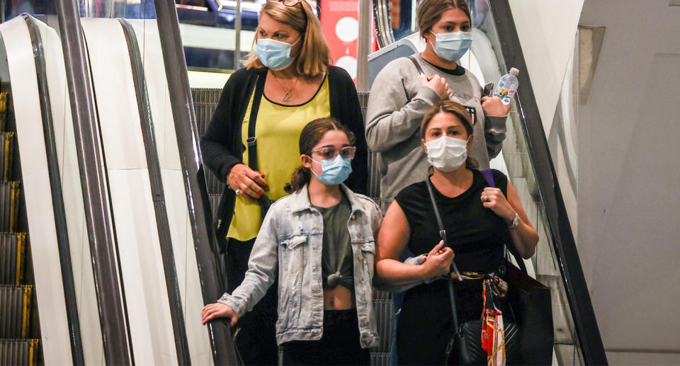 Sydney residents are required to wear face masks until midnight Sunday due to the new infections. Source: AAP