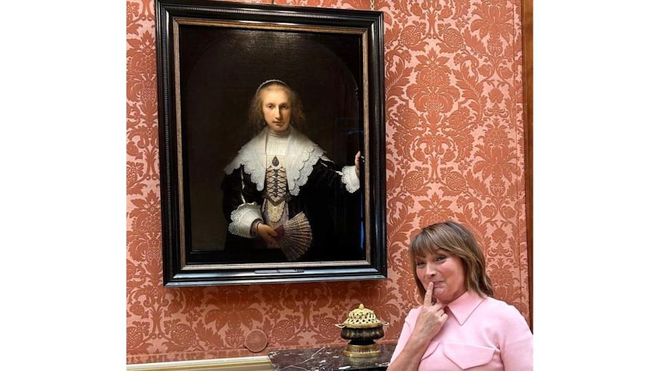 Lorraine shared a photo of a portrait inside Buckingham Palace