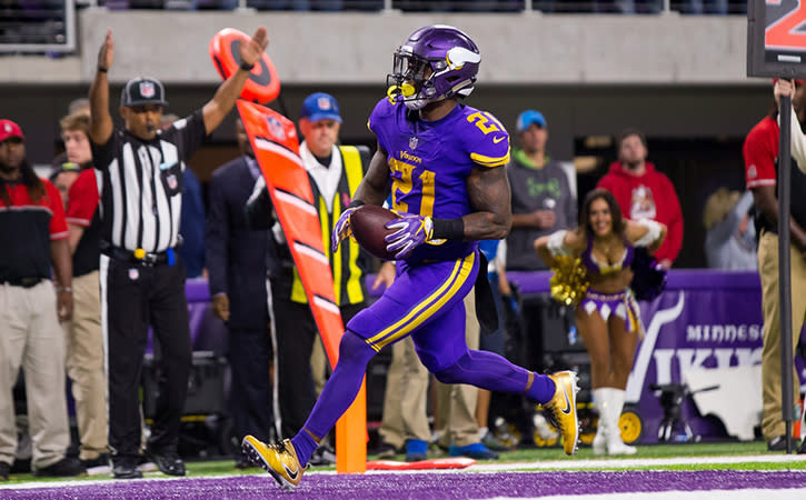 Dec 1, 2016; Minneapolis, MN, USA; Minnesota Vikings running back Jerick McKinnon (21) scores in the fourth quarter against the Dallas Cowboys at U.S. Bank Stadium. The Dallas Cowboys beat the Minnesota Vikings 17-15