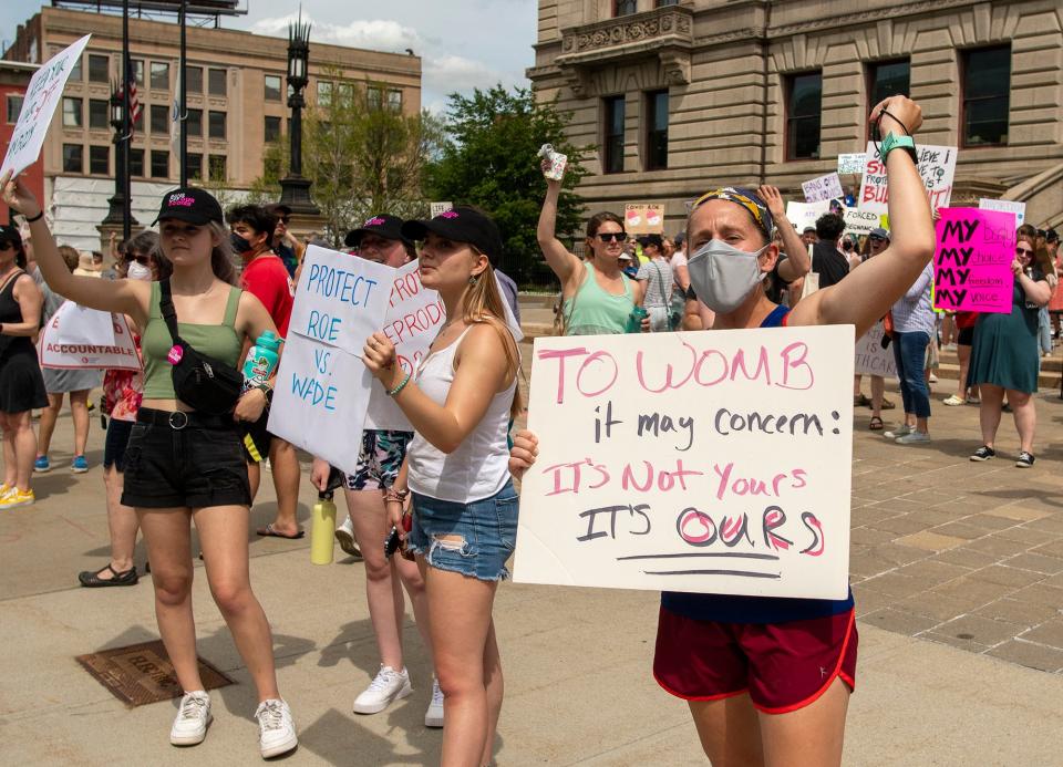 Protesters rally for abortion rights Saturday in front of City Hall.