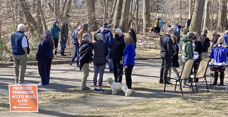 About 90 neighbors of the Rosemont Avenue area of Erie gather March 21, 2021, to listen to Mayor Joe Schember (not pictured) and other city officials talk about a proposal to put an access road to Ravine Drive as part of the project to demolish the nearby Kahkwa Bridge. One proposal would have put the access road off of Rosemont Avenue, just north of the bridge, and through a ravine. Schember backed off on the plan for the access road in response to the neighbors' complaints.