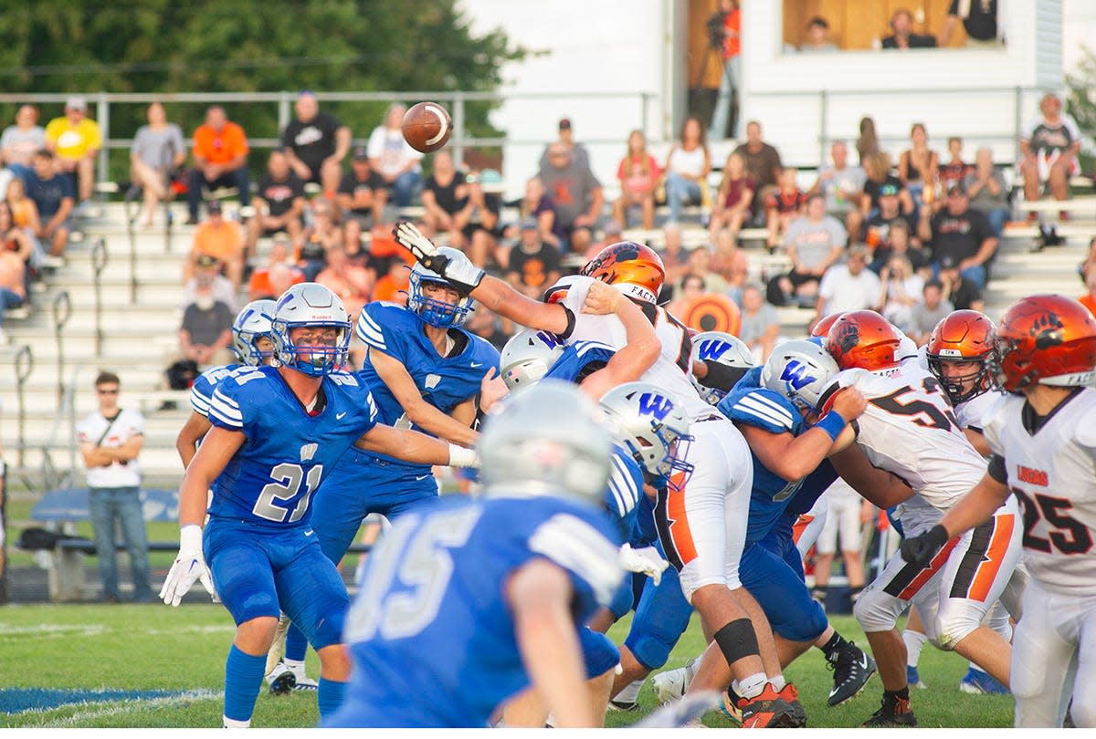 Wynford's Ashton Warren slings a pass out wide to Sam Collene.