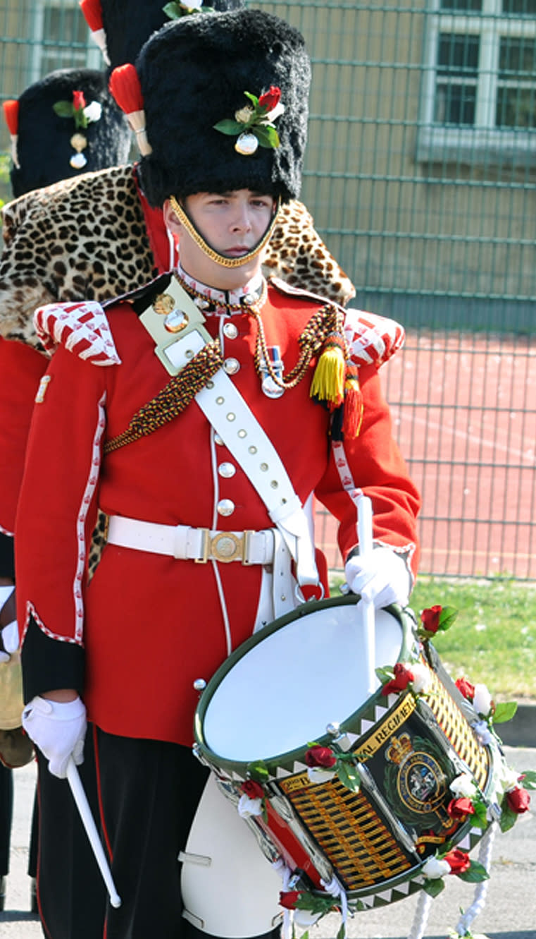 FILE - This undated file image released on Thursday May 23, 2013, by the British Ministry of Defence shows Drummer Lee Rigby of 2nd Battalion The Royal Regiment of Fusiliers. Sentencing is underway, Wednesday Feb. 26, 2014, for two al-Qaida-inspired extremists convicted for the murder of the off-duty British soldier who was stabbed to death in a frenzied attack on a London street. Self-described "soldier of Allah" Michael Adebolajo and accomplice Michael Adebowale were convicted in December of murdering 25-year-old Fusilier Lee Rigby, who was struck by a car then repeatedly stabbed with knives and a cleaver in front of horrified passers-by. (AP Photo/MOD, File)