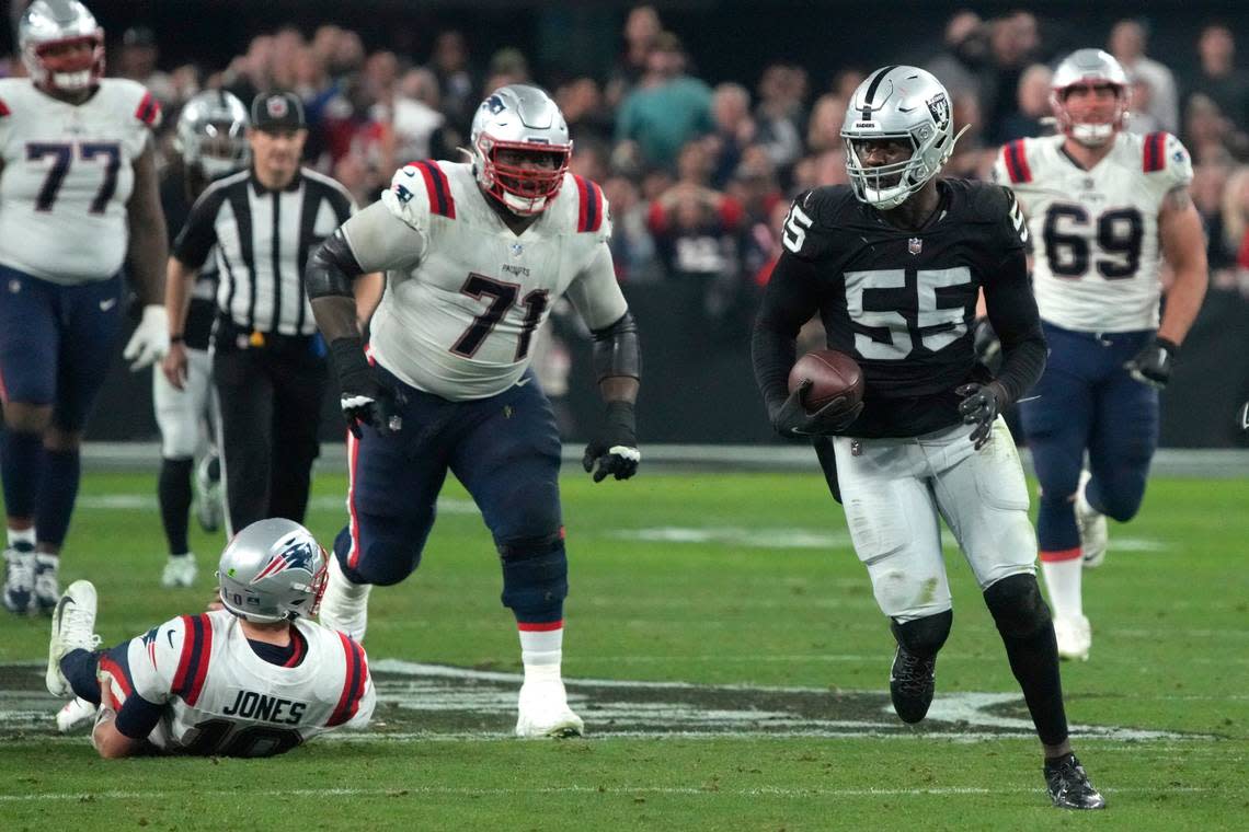 Las Vegas Raiders defensive end Chandler Jones returns a fumble for a touchdown against the New England Patriots during the second half of an NFL game, Sunday, Dec. 18, 2022, in Las Vegas.