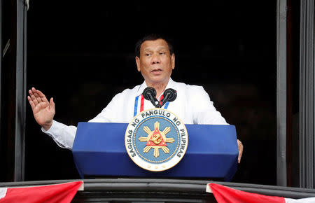 Philippine's President Rodrigo Duterte speaks during the 120th Philippine Independence day celebration at the Emilio Aguinaldo shrine in Kawit, Cavite Philippines June 12, 2018. REUTERS/Erik De Castro