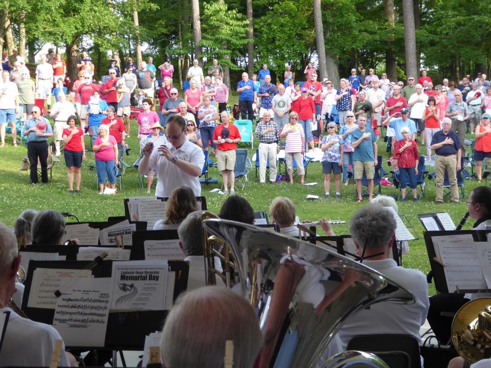 The Oak Ridge Community Band plays the national anthem at the 2019 Memorial Day Concert.