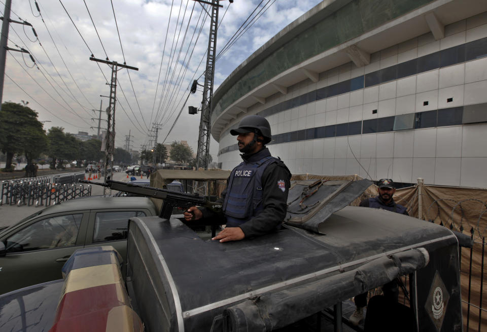 A police commando stands alert at a vehicle outside the Pindi Cricket stadium to ensure security ahead of first test match between Pakistan and Sri Lankan cricket teams in Rawalpindi, Pakistan, Monday, Dec. 9, 2019. Sri Lanka's cricket team arrived in Pakistan to play two-test series that will be the first tests in Pakistan in over a decade. Sri Lanka was the last team to play a test match in Pakistan in 2009 before the team came under terrorist attack at Lahore and the doors to international cricket were closed on Pakistan. (AP Photo/Anjum Naveed)