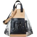 <p><em><em>Loewe bag</em>, </em><span>£3,620, <a rel="nofollow noopener" href="https://www.24sevres.com/en-gb/hammock-bag-loewe_UJ4AN?color=black-natural" target="_blank" data-ylk="slk:24Sévres;elm:context_link;itc:0;sec:content-canvas" class="link ">24Sévres</a></span><br></p>